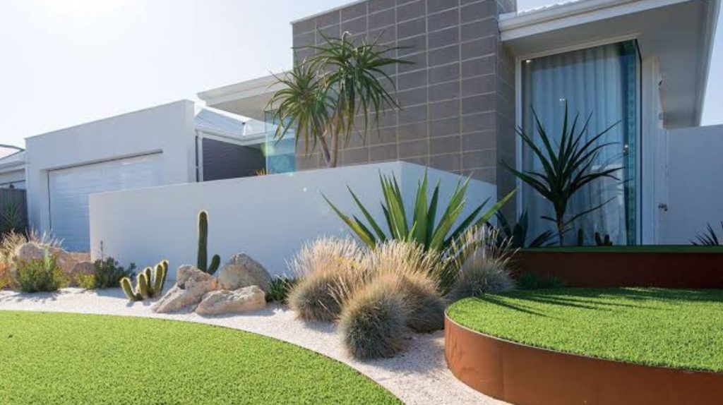 a modern home with landscaping